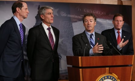 Republican senator Rand Paul speaks as a bipartisan group of senators launch new legislation to rein in the NSA. From left: Democratic senators Ron Wyden and Mark Udall, and on the right, Democrat Richard Blumenthal.