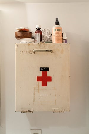 Homes - Oliver Jeffers: Retro bathroom cabinet with cross on door 