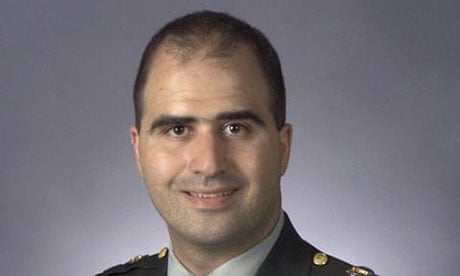 Nidal Hasan as he appeared before the Fort Hood shooting, after which he grew a beard
