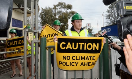 Climate change protesters wait for Tony Abbott at Penrice Soda Holdings in Adelaide.
