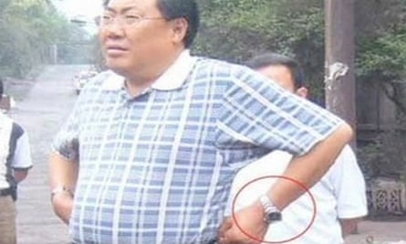 Yang Dacai wearing one of his collection of expensive wristwatches