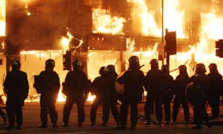 Riot police form a line in Tottenham, north London, during the 2011 riots