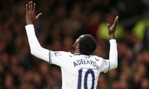 Emmanuel Adebayor celebrates scoring  Tottenham's first goal.