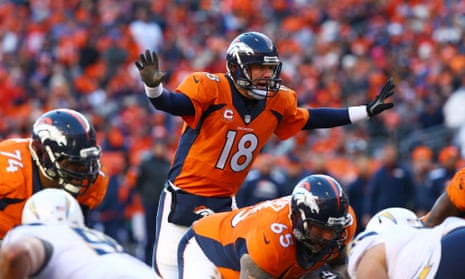 Peyton Manning of the Denver Broncos calls a play  against the San Diego Chargers during the AFC Divisional Playoff