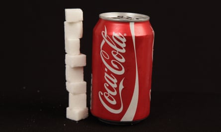can of coca cola / coke and sugar cubes