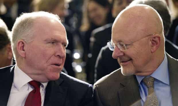 CIA director John Brennan  left, talks with the director of national intelligence James Clapper before Barack Obama outlined his NSA reforms.