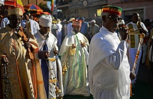 FTA: Carl de Souza: Priests walk during a procession
