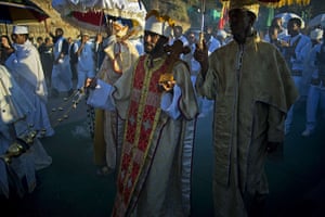 FTA: Carl de Souza: A priest waves a vessel containing incense