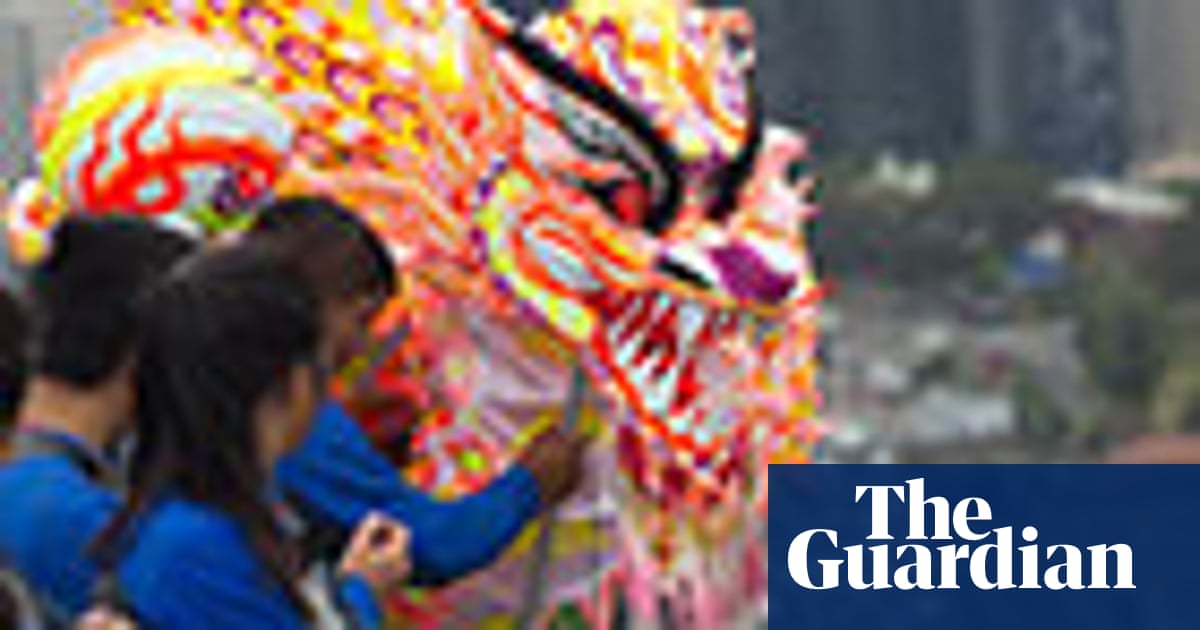 Hong locals Chinese new year dragons scale heights above Sydney – gallery