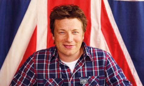 Jamie Oliver infront of flag
