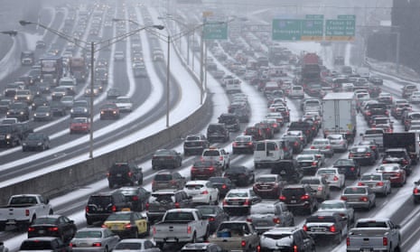 Rare winter ice storm cripples parts of US south | US news | The Guardian