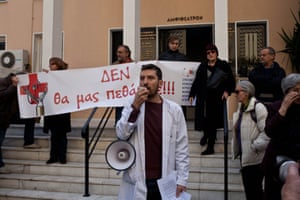 A protest against cuts in public health and security was organized by the coordination of self organizing social health services, as well by unions of cancer patients and hospital workers, in front of anticancer hospital Agios Savas, in Athens.
