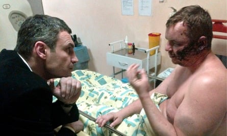 Vitali Klitschko speaks to Dmytro Bulatov in hospital