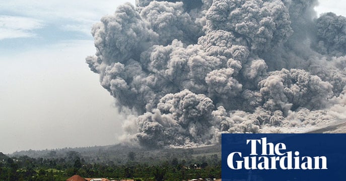 Residents flee amid fear of Mount Sinabung volcano eruption – in