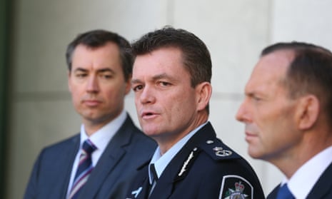 AFP commissioner Andrew Colvin (centre), justice minister Michael Keenan (left) and Tony Abbott.