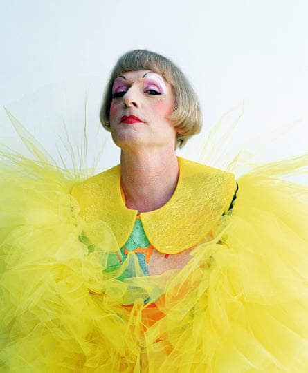 Grayson Perry in a yellow outfit and makeup