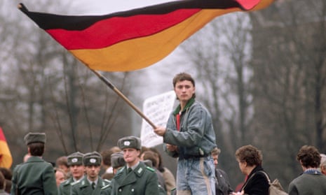 Man Waving West German Flag