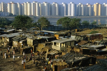 Poverty and wealth side by side in Bombay, India.