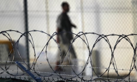 A detainee walks through the recreation yard at the detention center for "enemy combatants"  in Guantanamo Bay, Cuba. 