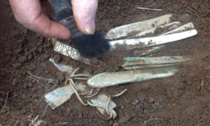 An archaeologist prepares the top level for removal of items found at an undisclosed location in Dumfries and Galloway