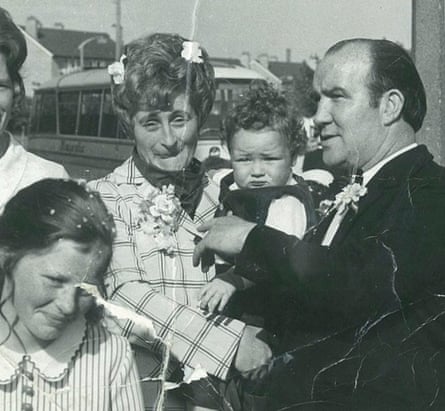 Margaret Tierney, front, with her parents in 1973.