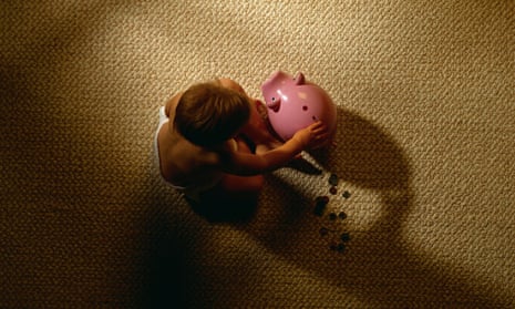Child and piggy bank.