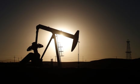 A pump jack is seen at sunrise near Bakersfield, California. Brent crude hit a new four-year low on Wednesday before recovering to just under $85 a barrel.