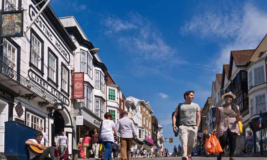 Shoppers on Guildford's historic high street.