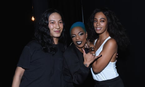 Alexander Wang, Sharaya J, and Solange Knowles pose backstage at the Alexander Wang X H&M Launch on October 16, 2014 in New York City.