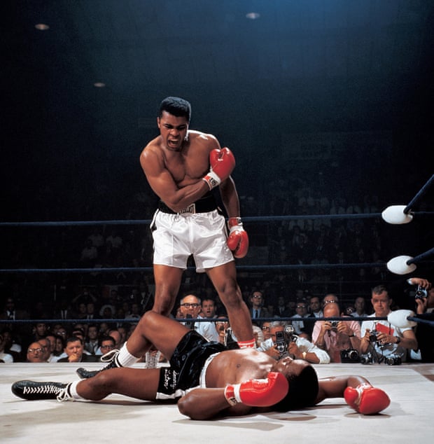Muhammad Ali towering over Sonny Liston in their second fight in 1965 after Liston had dropped to the canvas following the so-called 'phantom punch'. The fight lasted just two minutes and eight seconds.