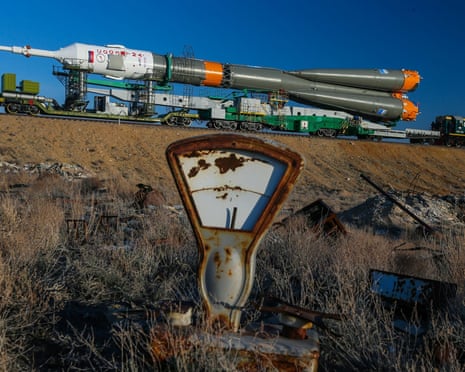 A rocket carrier with the 'Soyuz TMA-08M' spacecraft is moved to a launch pad behind an old weighing machine at the Baikonur cosmodrome in Kazakhstan, in March 2013.