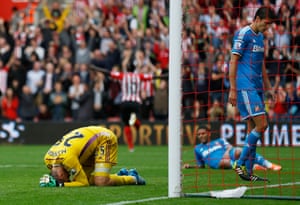 Despair for goalkeeper Vito Mannone and the Sunderland defence as Sadio Mané celebrates scoring the final goal in Southampton's 8-0 trouncing of Sunderland. Mannone was so embarrassed by his and Sunderland's performance he suggested that the players pay back the ticket and travel expenses of the away fans