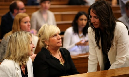 Oscar Pistorius's sister Aimee (right) talks to Reeva Steenkamp's mother, June Steenkamp (left).