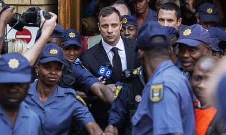 Oscar Pistorius leaves court after he was found guilty of culpable homicide.