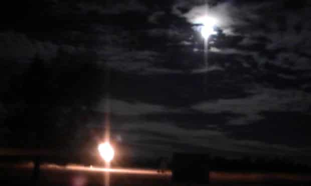 Wilga Park, Narrabri gas flare against the super moon in August.