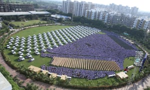 Cars are lined up for Sunday’s bonus presentation ceremony to staff at Hari Krishna Exports in Surat.