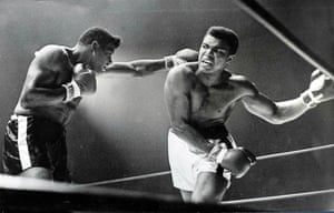 Ali evades a left hand jab from Floyd Patterson in their 1965 bout. Clay retained his title by technical knock-out in the 12th round.