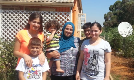 Layali ibrahim (right) with her brothers, sister and mother, Avin, who is holding 15-month-old Omar.