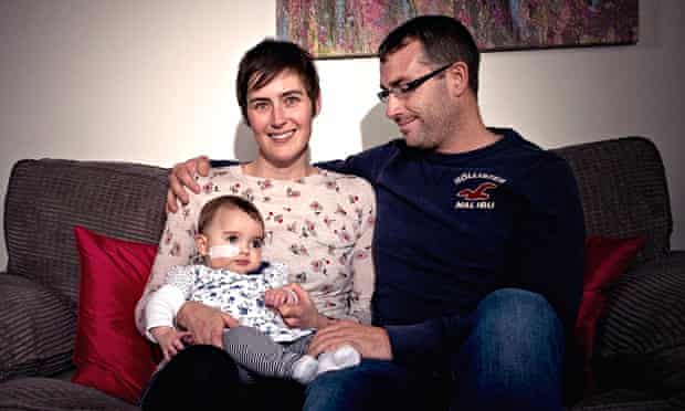 Vicky Holliday and husband Keith with their baby, who has Leigh's syndrome