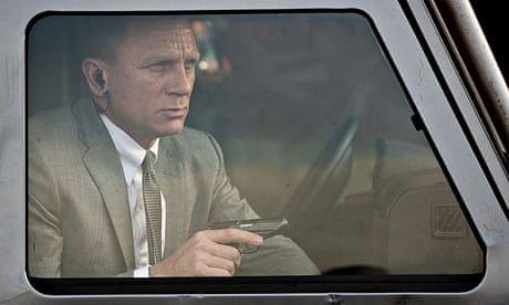 James Bond sat with a gun in a car in Skyfall