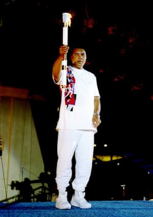 An emotional moment for Ali, who, visibly shaking due to the effects of Parkinson’s disease, holds the Olympic torch during the Opening Ceremony of the 1996 Olympic Games in Atlanta.