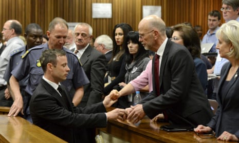 Oscar Pistorius led away to police cells