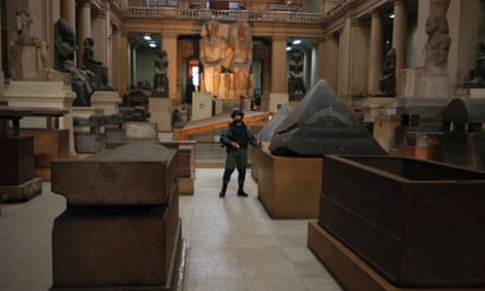 A member of the Egyptian special forces stands guard in the Egyptian Museum in Cairo in January 2011 after would-be looters broke in.