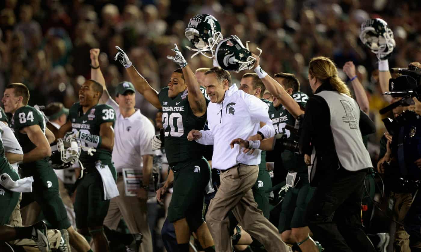 Michigan State's superhero coach Mark Dantonio puts Batman in shade