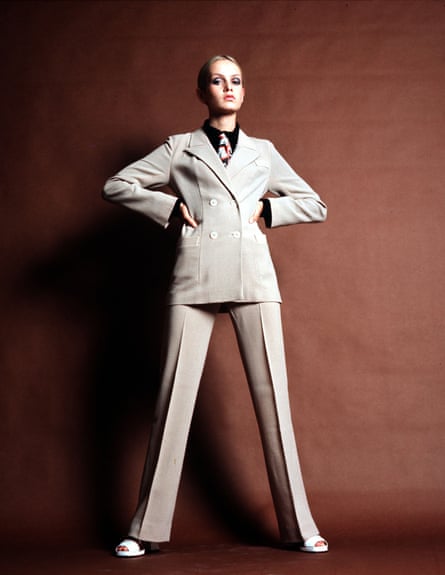 Twiggy is pictured in a cream trouser suit in 1968.