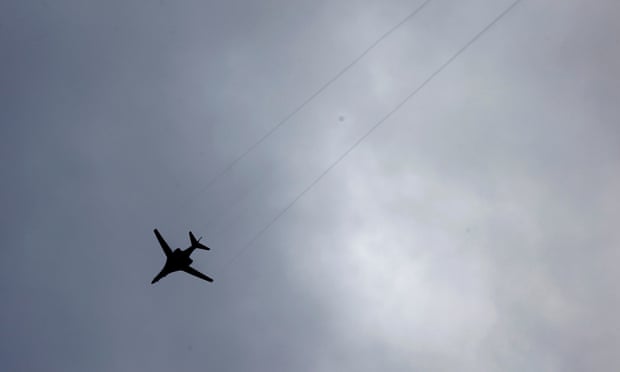 unidentified military plane flies over Kobani