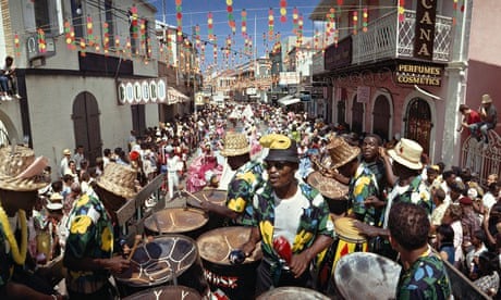 A calypso band plays on Main Street during a Transfer Day parade