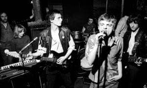 English rock group The Fall performing at The Ranch, Manchester's first punk club, 18th August 1977. Left to right: Una Baines, Martin Bramah, Karl Burns (drums), Mark E. Smith and Tony Friel. (Photo by Kevin Cummins/Getty Images)