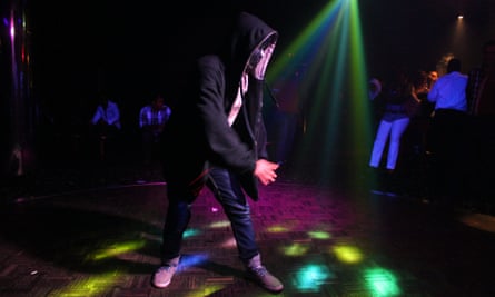A young man dances in an Aleppo club.
