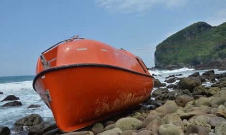 An orange disposable lifeboat that washed up on central Java's Karangjambe beach in February. The lifeboat is part of the federal government's boat turnback policy.